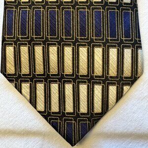 Vintage handmade 100% Umberto Bossi silk tie geometric pattern in navy, cream